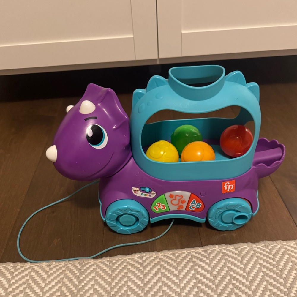 Fisher-Price Poppin Dinosaur Pull Toy